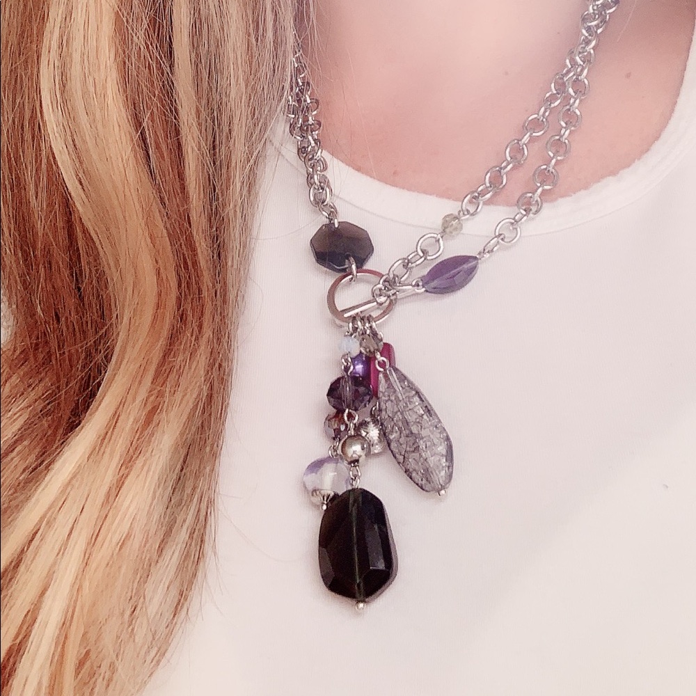 Silver necklace with purple and black beads